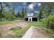 View of backyard area, featuring garage under construction ready for customization at 3353 Hemphill St, Atlanta, GA 30337