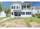 Exterior view of new house featuring windows and a large backyard at 3353 Hemphill St, Atlanta, GA 30337