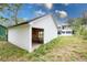 Detached garage featuring a white exterior in back of the house at 3353 Hemphill St, Atlanta, GA 30337
