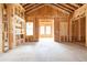 Interior view of a house under construction, showing the framing and layout of the future living space at 3353 Hemphill St, Atlanta, GA 30337