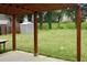 Expansive backyard features a wood pergola and an exterior storage shed at 615 Old Johnson Rd, Lawrenceville, GA 30045