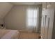 Bedroom features carpet, ample natural light and neutral paint at 615 Old Johnson Rd, Lawrenceville, GA 30045