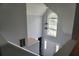 Inviting entryway featuring a modern light fixture and a glimpse of the front door at 615 Old Johnson Rd, Lawrenceville, GA 30045