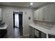 Contemporary kitchen with light gray cabinets, white countertops, and views to the breakfast nook at 615 Old Johnson Rd, Lawrenceville, GA 30045