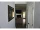 View of the living room showcasing the fireplace and the sofa with hardwood floors at 615 Old Johnson Rd, Lawrenceville, GA 30045