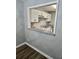 View of kitchen area from dining room, highlighting updated countertops and cabinets at 907 River Run Dr, Atlanta, GA 30350