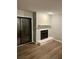 Living room featuring modern fireplace and flooring at 907 River Run Dr, Atlanta, GA 30350