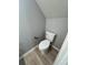 Modern powder room with a toilet and light gray wall color at 912 Holden Ln, Atlanta, GA 30349