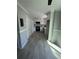 Bright kitchen with white cabinets, subway tile backsplash, modern appliances, and new floors at 912 Holden Ln, Atlanta, GA 30349