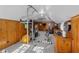Home gym in basement with exercise machines, workout equipment and paneled walls for fitness enthusiasts at 1285 Oakdale Ne Rd, Atlanta, GA 30307
