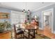 Traditional dining room with hardwood floors, natural light, chandelier and neutral wall color at 1285 Oakdale Ne Rd, Atlanta, GA 30307