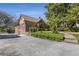 Quaint brick house with lush landscaping, showcasing classic architecture and curb appeal at 1285 Oakdale Ne Rd, Atlanta, GA 30307