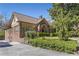 A home with brick and light siding, complemented by stone wall and vibrant landscaping at 1285 Oakdale Ne Rd, Atlanta, GA 30307