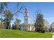 Picturesque church on a lush green lawn with classic architecture and a soaring steeple at 1285 Oakdale Ne Rd, Atlanta, GA 30307