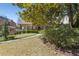 Beautiful brick home with a manicured lawn and mature trees, creating a welcoming curb appeal at 1285 Oakdale Ne Rd, Atlanta, GA 30307