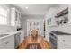 Well-lit kitchen with stainless steel appliances, white cabinetry, tile backsplash, and a breakfast nook at 1285 Oakdale Ne Rd, Atlanta, GA 30307