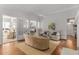 Bright living room with hardwood floors, white trim, and neutral furnishings at 1285 Oakdale Ne Rd, Atlanta, GA 30307