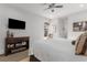 Spacious main bedroom with TV, dresser, carpet, and a luxurious king-size bed at 1285 Oakdale Ne Rd, Atlanta, GA 30307
