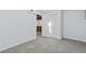 Basement room showcases clean walls, updated carpet, and access to closet at 2241 Glendale Dr, Decatur, GA 30032