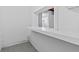 A unique feature of the unfinished basement includes an open space under a shelf at 2241 Glendale Dr, Decatur, GA 30032