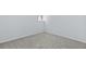 Basement room with carpet, small window, and neutral paint is ready for customization at 2241 Glendale Dr, Decatur, GA 30032
