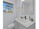 Stylish bathroom with a modern vanity, black hardware, and a neutral color scheme at 2241 Glendale Dr, Decatur, GA 30032