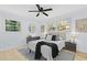 Well-lit bedroom with a black and white rug, neutral-toned furniture, and natural light at 2241 Glendale Dr, Decatur, GA 30032