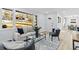 Open living area with comfortable seating, large windows, and seamless flow to dining space at 2241 Glendale Dr, Decatur, GA 30032