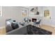Comfortable living room with fireplace, accent chairs, neutral paint, and a large black rug at 2241 Glendale Dr, Decatur, GA 30032