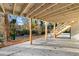 View of patio area with ceiling of deck with staircase to the backyard at 2241 Glendale Dr, Decatur, GA 30032
