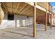 View of patio area with ceiling of deck with white painted brick and supports at 2241 Glendale Dr, Decatur, GA 30032