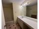 Bathroom with tile floor, vanity and ample lighting and a shower/tub combination at 25 Fair Haven Way, Smyrna, GA 30080