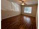 Bedroom with laminate flooring, a ceiling fan, natural light from windows and blinds at 25 Fair Haven Way, Smyrna, GA 30080