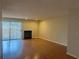 Spacious living room features a fireplace and sliding glass doors to the outdoors at 25 Fair Haven Way, Smyrna, GA 30080