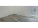 Bright bedroom features modern gray flooring and a large window at 3131 Leyland Ct, Decatur, GA 30034