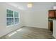 Bright dining area features stylish lighting, a large window, and modern flooring at 3131 Leyland Ct, Decatur, GA 30034