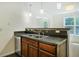 Kitchen area featuring a stainless steel dishwasher and dual basin sink and bar top at 3131 Leyland Ct, Decatur, GA 30034