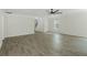 Spacious living room with gray hardwood flooring and ceiling fan at 3131 Leyland Ct, Decatur, GA 30034