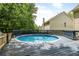 Backyard pool with a wooden deck and privacy fencing at 3131 Leyland Ct, Decatur, GA 30034