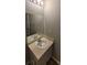 Bright bathroom with stylish vanity, mirror, and well-maintained fixtures at 930 Parkway Rd, Union City, GA 30291