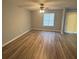 Bedroom showcasing modern ceiling fan, ample sunlight, and neutral wall color at 930 Parkway Rd, Union City, GA 30291
