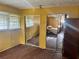 Bedroom with mirrored closet doors and natural light from windows at 2019 Thomasville Se Dr, Atlanta, GA 30315