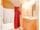 Neat bathroom featuring a shower-tub combo and a vanity with storage at 2904 Ridgeview Sw Dr, Atlanta, GA 30331