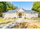 Charming exterior with a walkway, manicured lawn, and lush landscaping at 2904 Ridgeview Sw Dr, Atlanta, GA 30331