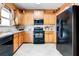 Functional kitchen with dark appliances, ample counter space and cabinets at 2904 Ridgeview Sw Dr, Atlanta, GA 30331