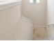 Bright staircase showcasing neutral walls, and a plant adding a touch of elegance to the home at 2904 Ridgeview Sw Dr, Atlanta, GA 30331