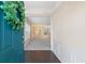 Open foyer showcasing hardwood floors and wainscoting, leading into a bright and airy living space at 3915 Deerborne Dr, Cumming, GA 30040