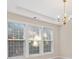 Living room with large windows and decorative lighting at 3915 Deerborne Dr, Cumming, GA 30040