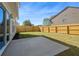 Backyard featuring a newly installed wooden fence, sod and an extended patio at 5620 Weddington Drive Dr, Cumming, GA 30040