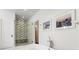 Bright bathroom features a soaking tub, glass shower and decorative tile at 123 Peachtree Cir, Atlanta, GA 30309
